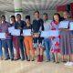 French learners presenting their certificates